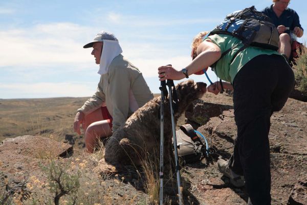 Debbie demonstrates the need for a doggie hydration pack.
