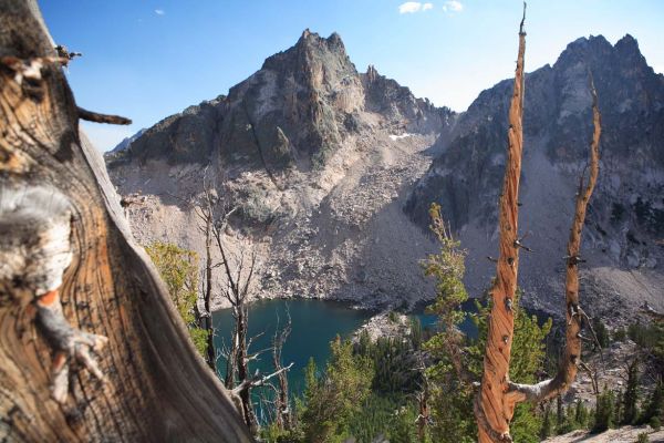 Packrat Peak, to the left of Mayan Temple, towers above above Warbonnet Lake.
