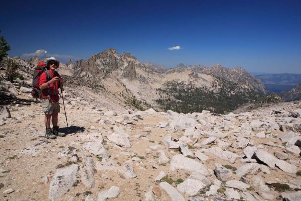 Fred captures the moment on the saddle just north of Reward Peak.  Redfish Lake can be seen in the valley.  Mount Underhill dominates the foreground. 
