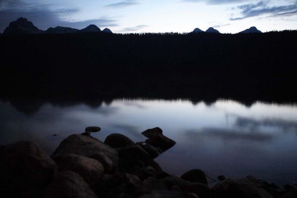 Failing light reflected from Redfish Lake.
