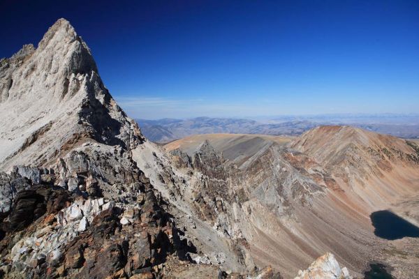 The Chinese Wall descends east to the Gunsight, the lowpoint on the ridge directly up the fall line above Gunsight Lake.  The convex ridge to the north in the center is Railroad Ridge.
