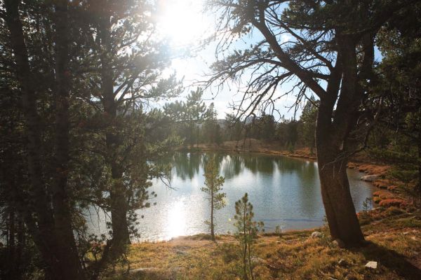 Late afternoon view southwest; lake 9555 in the upper Born Lakes Basin.
