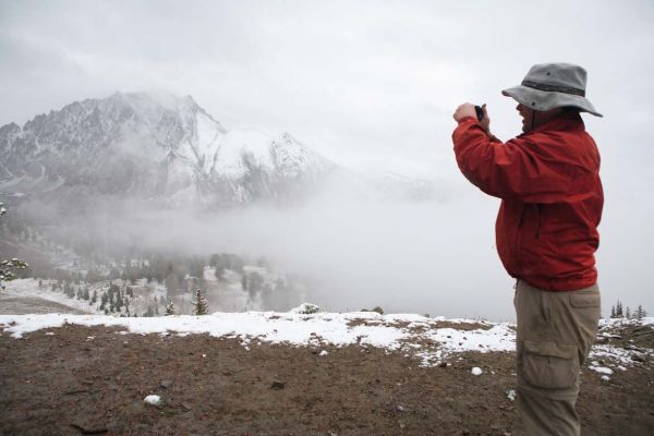 Fred photographs Castle Peak from the ridge a mile south of Chamberlain Basin.
