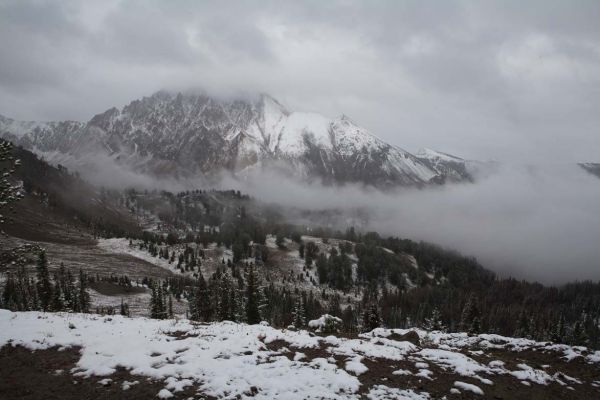 Fog rises in the valley southeast of Chamberlain Basin.
