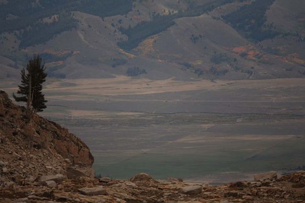 Fall colors still apparent in shadow on the hillsides above the Salmon River in the Sawtooth Valley to the east.
