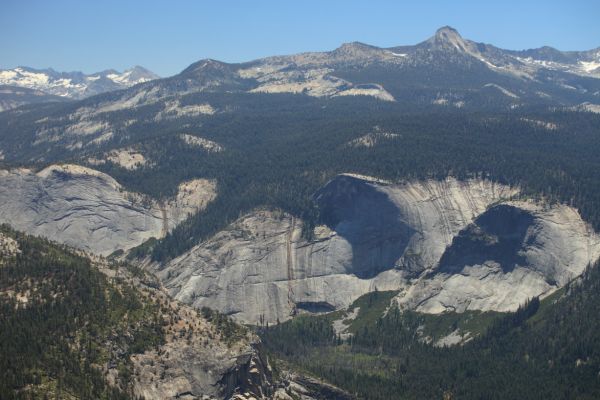 West, southwest from the summit of Half Dome, the snow-covered Sierra Crest rises east of June Lake and Mammoth on the far left.  Mt. Clark is the highest point on the ridge in the right foreground.  In the lower right is Little Yosemite Valley, where we camped the evening before.
