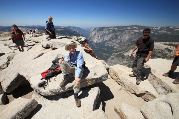 16mm wide angle view of the Professor on the summit of Half Dome overlooking Yosemite Valley to the west.
