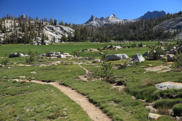 From left to right, Columbia Finger (far left), Echo Peaks, and The Cockscomb (far right); Cathedral Range above Long Meadow.
