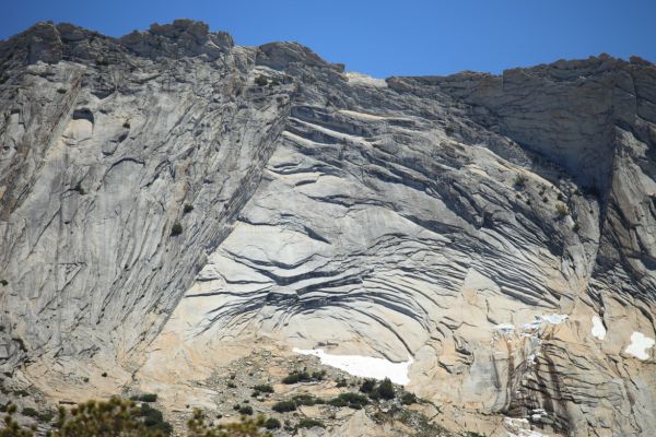 Exfoliating granite on the south face of The Cockscomb; Cathedral Range, from .08 miles south of 9700' Cathedral Pass.
