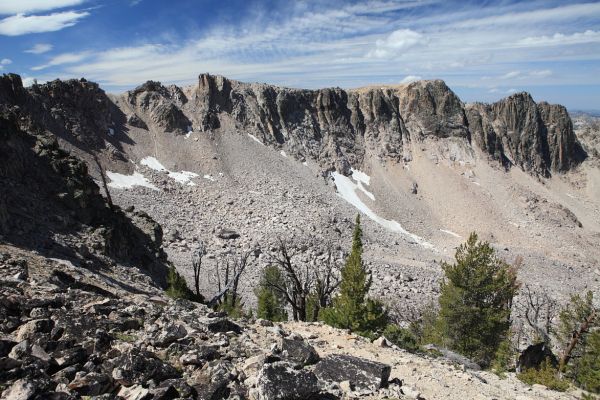 The southwest walls of the valley above Packrat Lake from the saddle north of Reward Peak.
