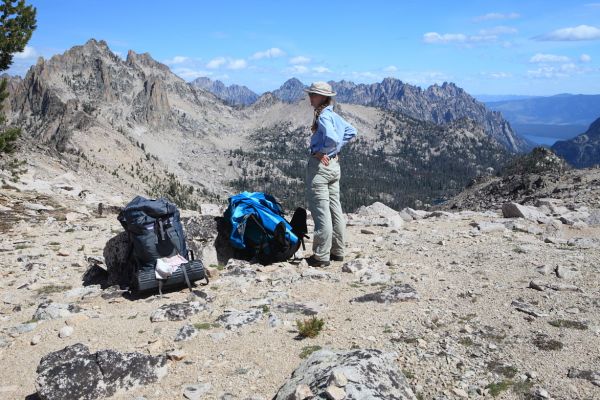 At 9720, the saddle north of Reward Peak is the highest elevation on this trip.  The view to the northeast takes in Thompson Peak, Williams Peak, Hosrtman Peak, and our starting point, Redfish Lake. 
