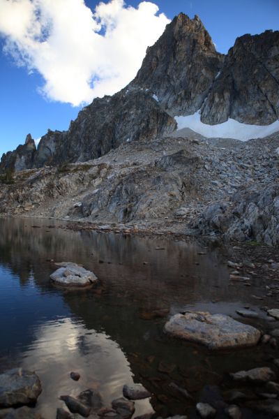 The upper lake in the cirque below the east face of Thompson Peak.
