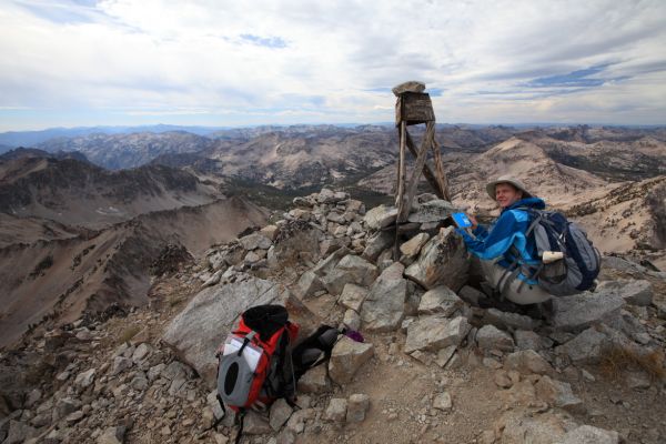 The summit register is found nestled in the cairn.
