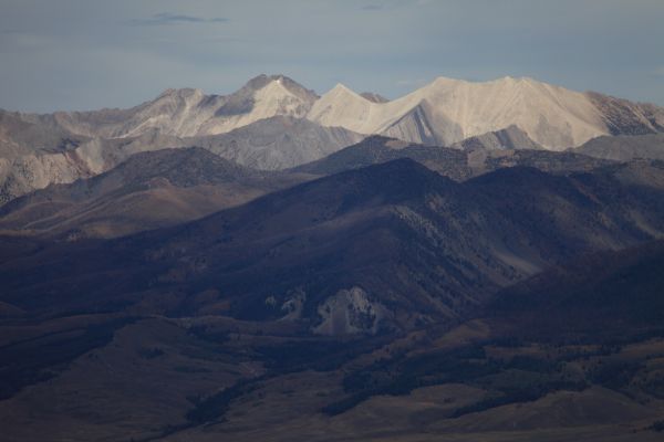 The White Clouds to the east.  D. O. Lee Peak is the brilliant white pyramid left of center.
