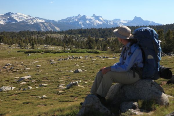 From Gaylor Lakes basin looking southwest across Tuolumne Meadows to Cathedral Peak (above pack).
