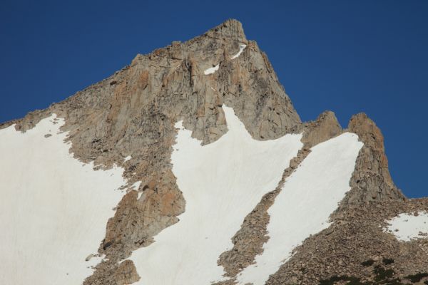 "North Peak's amazingly sharp summit horn towers prominently to the northwest," Steve Roper, Timberline Country, The Sierra High Route.
