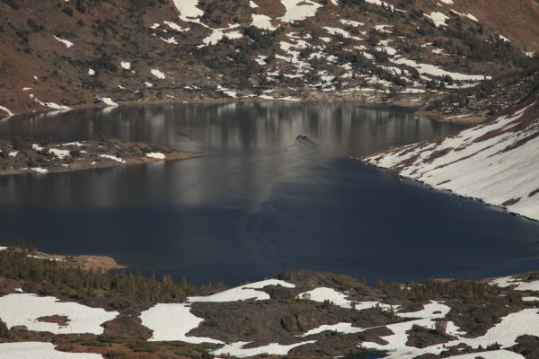 "On the visible portions of Saddlebag Lake, anglers' boats scuttle about like water beetles on a pond."  Steve Roper, Timberline Country, The Sierra High Route.
