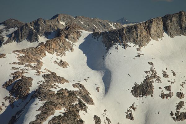 South from Sky Pilot Col, Mt. Maclure is seen on the horizon to the right of center.  Mt. Lyell, just to the left, is hidden by White Mountain just beyond the east ridge of Mount Conness. 
