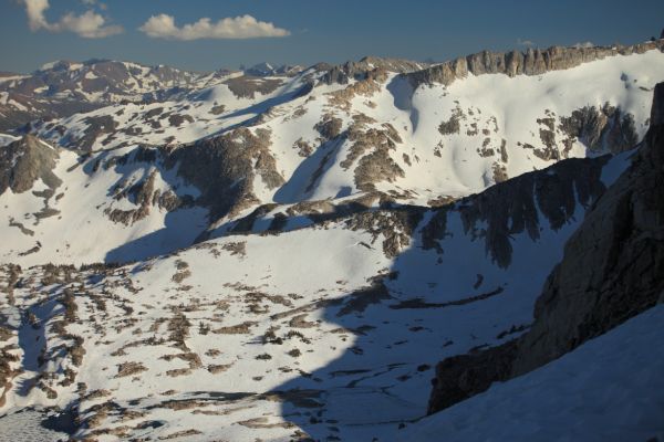 This view south from Sky Pilot Col reveals the route we travelled most of the day, starting at Alpine Lake, hidden from view by the east ridge of Mount Conness, and up to the top of Sky Pilot Col.
