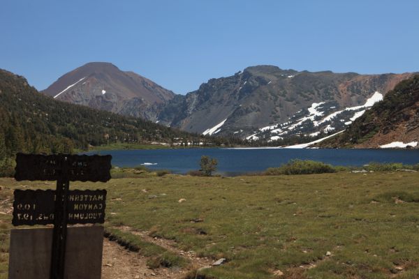 Arriving at Summit Lake, we notice how much it has opened up since last being here seven days ago.  The old rusty iron signposts of Yosemite National Park remind me of my earliest days backpacking.
