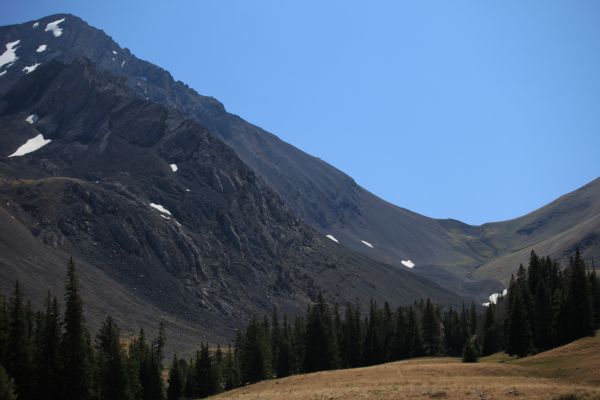 Lower west ridge of Leatherman Peak rises from the pass.
