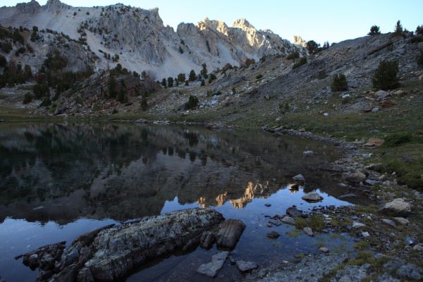 Peaks reflected at inlet, north end of Pass Lake.
