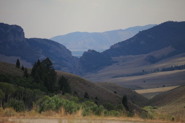 From Pass Creek Summit at the crest of the Lost River Range, the Big Lost River Valley is seen to the south with the Pioneer Mountains rising beyond.
