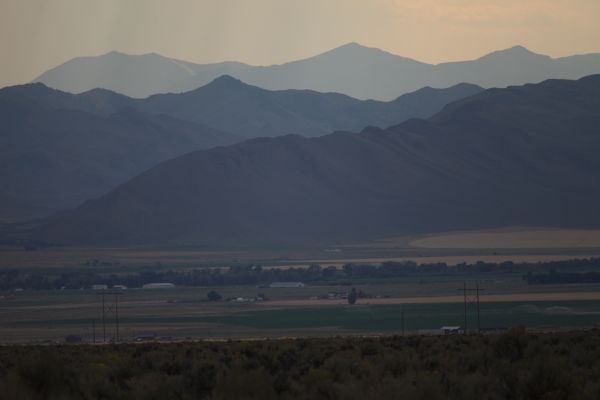 Leslie Butte, The White Knob Mountains, and the Pioneer Mountains rising behind; west from the Big Lost River Valley.
