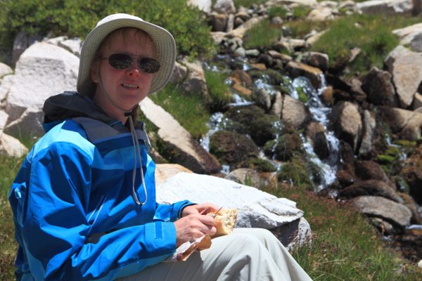 My favorite part of hiking; snacking on sourdough, cheese and salami in alpine meadows next to a cascading stream; Evolution Basin 11400'.
