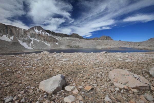 Wide angle view, looking northwest from southeast of Wanda Lake, past Mt. Goddard.  High clouds moving in from the northwest.
