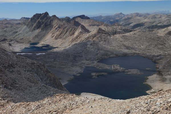 Davis (left) and Wanda Lake from the summit of Mt. Solomons.  Mt. McGee stands above Davis Lake.  Mt. Ritter and Banner Peak (west of Mammoth Lakes) are visible on the distant horizon on the right edge of the photo.
