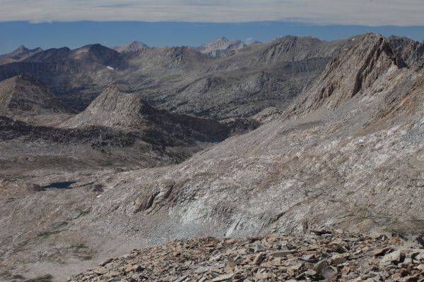 Our route will eventually take us over Lamarck Col via the Darwin Bench, the entrance to which can be seen in the center of the photo, above the long ridge leading down and right (west) from peak 12245'.  That route climbs from the JMT just before the JMT drops down into Evolution Valley.
