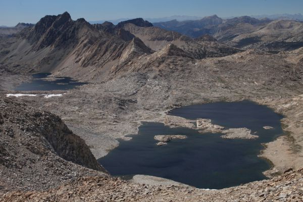 Wanda Lake in the right foreground, from the summit of Mt. Solomons.  To the west (upper left corner), Mt. McGee rises above Davis Lake.  The Matthes Crest (upper right of photo) rises above Evolution Valley to the northwest.
