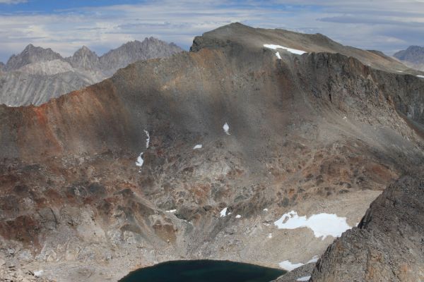 To the east, beyond the Black Giant and the Black Divide, Mt. Agassiz (left, 13,891'), Mt. Winchell (13775'), and Thunderbolt Peak (14003') at the northern end of the Palisade Region, on the Sierra Crest.
