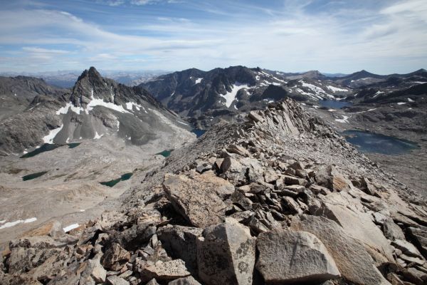 A wide angle shot looking south from the summit of Mt. Solomons, into the Ionian Basin.  The entrance to the 'Enchanted Gorge' between Scylla and Charybdis is just left (east) of center; lakes 11592 and 11837 to the right.
