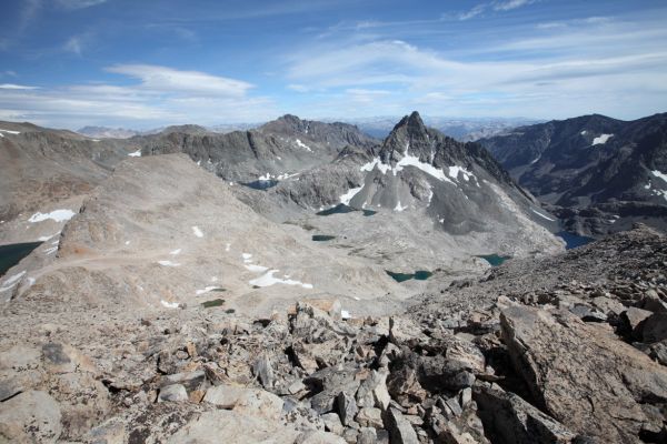 South from the summit of Mt. Solomons, the entrance to the not so 'Enchanted Gorge' guarded by Scylla and Charybdis, can be seen beyond Chasm Lake, the first lake visible from the right frame of photo.  Scylla is split by the right frame of photo.
