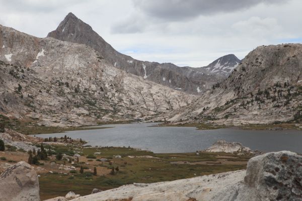 Looking southeast over Evolution Lake, from left to right, Mt. Huxley, Muir Pass, and Mt. Solomons.
