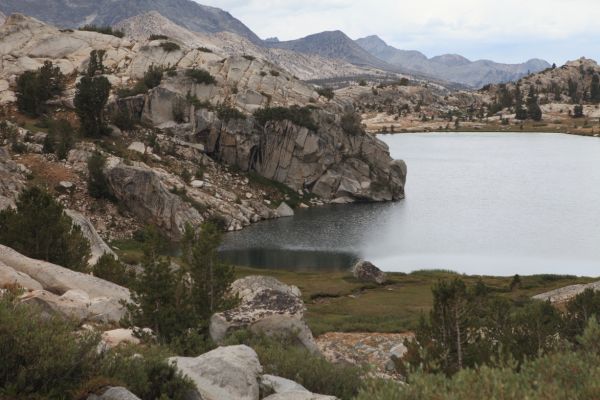 A rock outcrop jutting into the northeast end of Evolution Lake.
