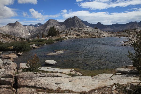 The view into Evolution Basin from high on the Darwin Bench.  Left to right in foreground, Mt. Spencer, Mt. Warlow, Mt. Huxley; the Goddard Divide in the distance.
