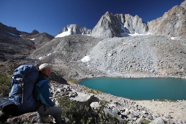 The milky blue color of the lake results from the glacial silt washing into the lake from above.
