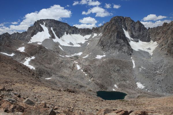 This tarn, or small lake, at 11750' is actually higher in the canyon and further east than where we camped the evening before.
