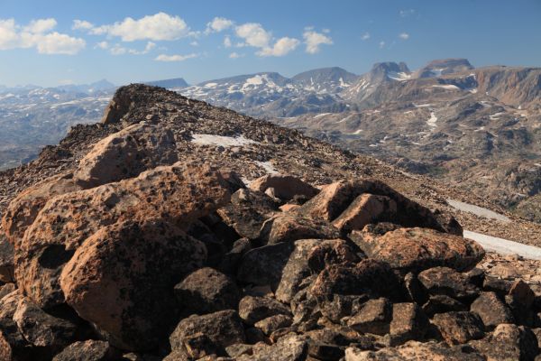 In the foreground is Lonesome Mountain's north summit.  On the distant horizon immediately left is Granite Peak, Montana's highest peak.
