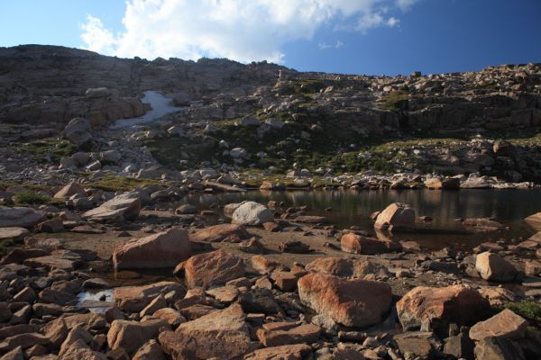 Tarn between Lonesome Mountain's broad south ridge and Albino Lake.
