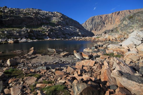 Tarn between Lonesome Mountain's broad south ridge and Albino Lake.
