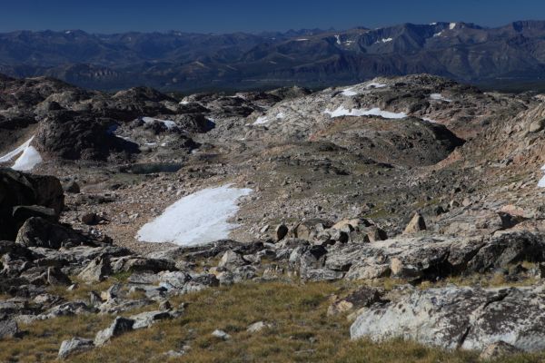 A wide view to the soutwest; Pilot Peak is visible on the horizon.  Donelson Lake is in the left foreground.
