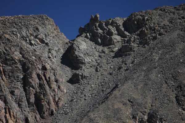 A telephoto view (280 mm) of obstacle on southwest ridge of Sky Pilot Mountain.
