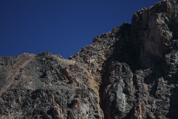 A telephoto view (280 mm) of southwest ridge of Sky Pilot Mountain just below summit.
