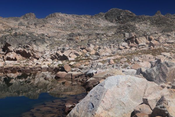 Looking north across Donelson Lake; Sky Pilot Mountain on the skyline (left), Whitetail Peak(?) on the skyline (right).
