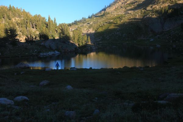 Elisa returns to camp from with water for cooking; Kidney Lake.
