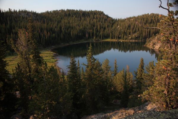 Mule Lake (about 9400' unnamed on our map) just downstream from Hidden Lake.   The camp had a huge canvas tent supported by hewn timber and was occupied by a large party.  Numerous stock had carried in just about every amenity.
